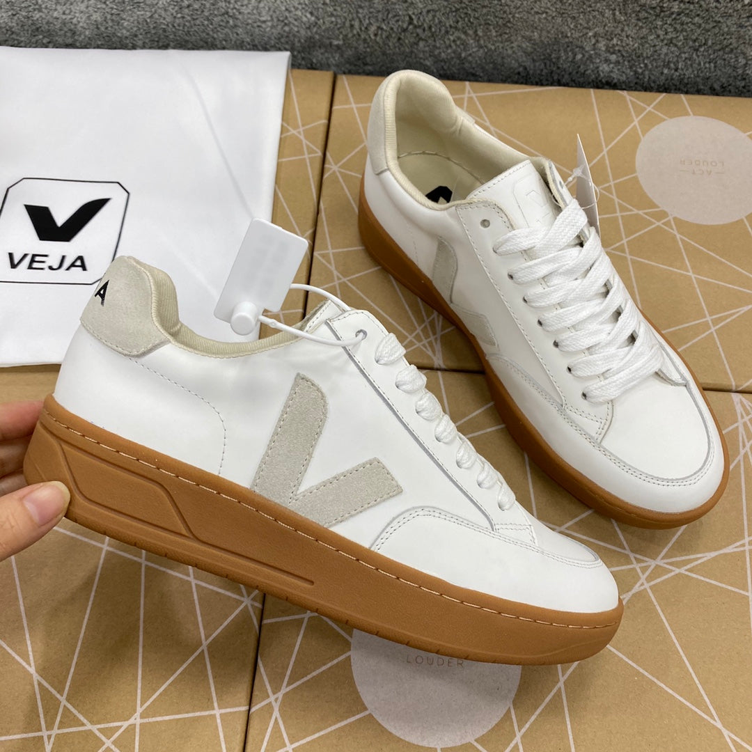 Zapatillas Ve Ja Blancas plataforma cafe logo gris
