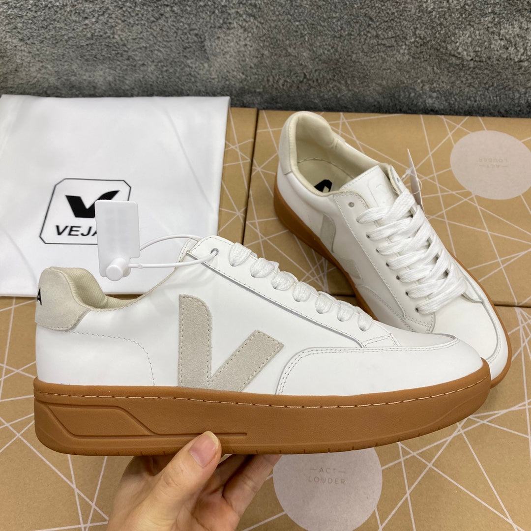 Zapatillas Ve Ja Blancas plataforma cafe logo gris