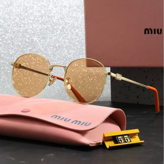 Gafas miu redondas doradas vidrio amarillo