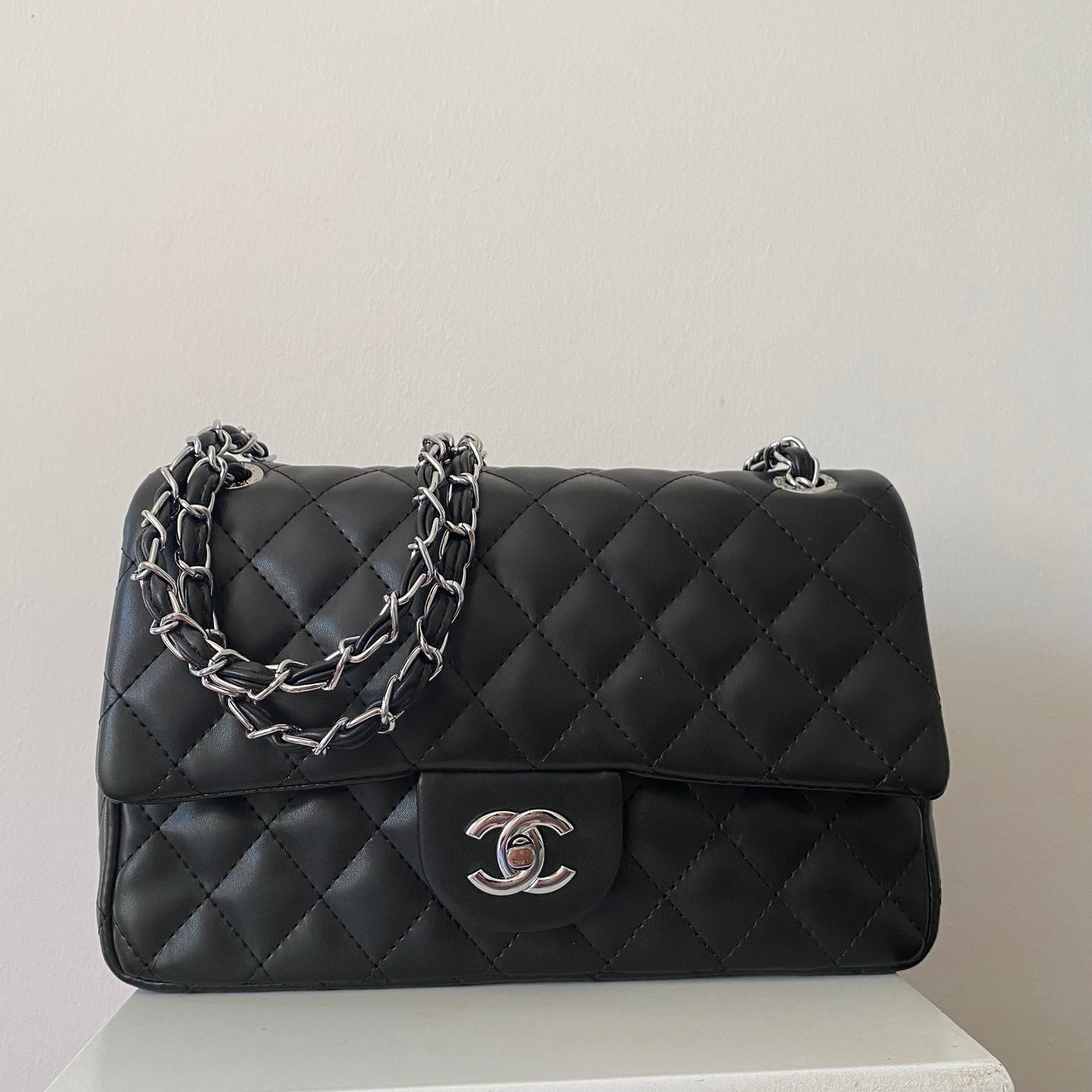 Cartera negra CC