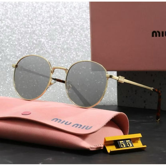 Gafas miu redondas doradas vidrio polarizado